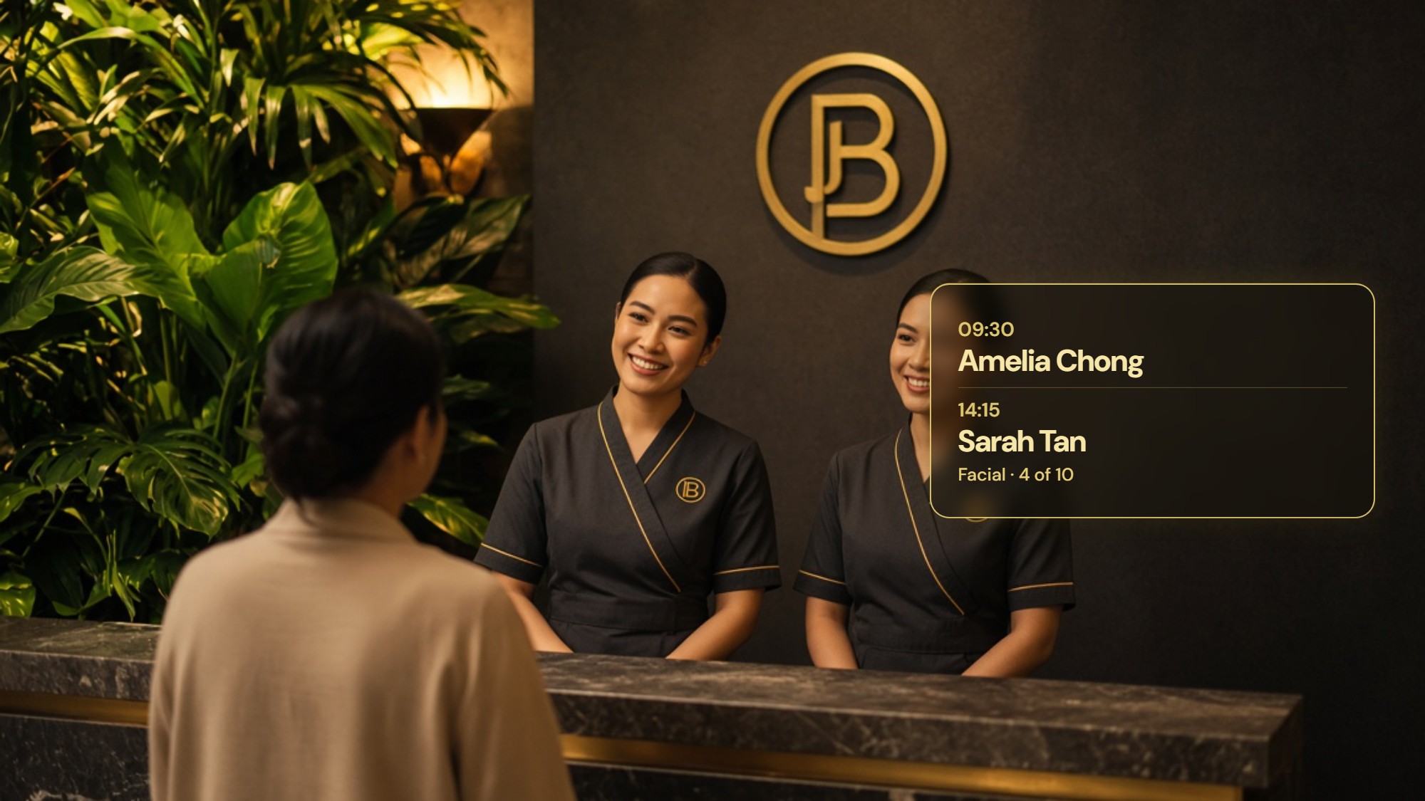 Front desk with today's bookings: Amelia Chong 09:30 and Sarah Tan 14:15 Facial.